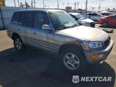 Czwarte zdjęcie samochodu z boku: 2000 TOYOTA RAV4 BASE VIN:JT3GP10V2Y7073843 - miniatura