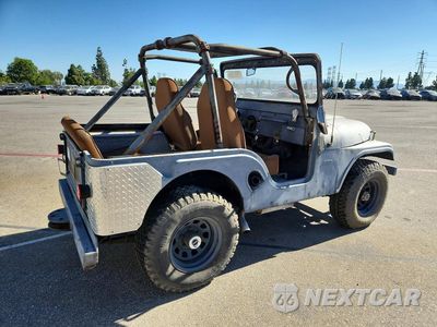 Trzecie zdjęcie samochodu z tyłu: 1963 JEEP WRANGER VIN:57548160523 - miniatura