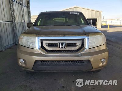 Piąte zdjęcie samochodu w środku: 2011 HONDA PILOT TOURING VIN:5FNYF3H94BB021184 - miniatura