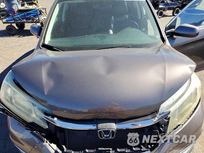 Zdjęcie 12 z 13 samochodu: 2015 HONDA CR-V EXL VIN:2HKRM4H78FH666684 - miniatura