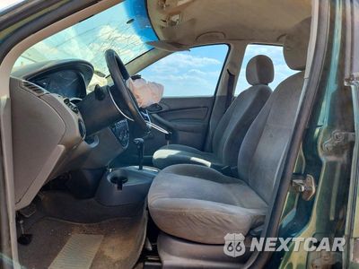 Zdjęcie 7 z 12 samochodu: 2001 FORD FOCUS LX VIN:1FAFP33P81W296096 - miniatura