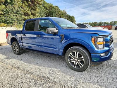 Czwarte zdjęcie samochodu z boku: 2023 FORD F150 SUPERCREW VIN:1FTFW1E55PKE35176 - miniatura