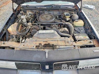 Zdjęcie 11 z 12 samochodu: 1987 OLDSMOBILE CUTLASS SUPREME VIN:1G3GR11Y5HP324630 - miniatura