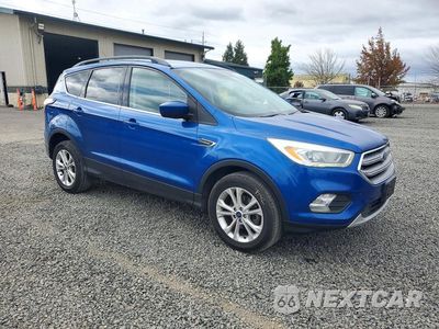 Czwarte zdjęcie samochodu z boku: 2017 FORD ESCAPE SE VIN:1FMCU0GD1HUC28129 - miniatura