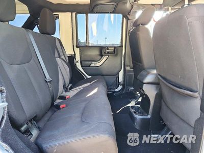Zdjęcie 10 z 12 samochodu: 2015 JEEP WRANGLER UNLIMITED SPORT VIN:1C4BJWDG4FL550678 - miniatura