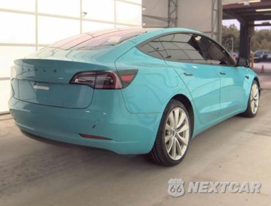 Czwarte zdjęcie samochodu z boku: 2018 TESLA MODEL 3 VIN:5YJ3E1EB0JF182543 - miniatura