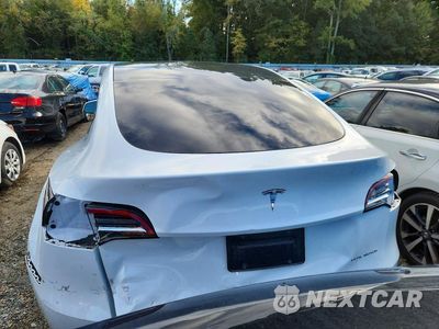 Zdjęcie 6 z 13 samochodu: 2021 TESLA MODEL Y VIN:5YJYGDEE3MF191964 - miniatura