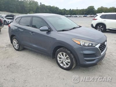 Czwarte zdjęcie samochodu z boku: 2019 HYUNDAI TUCSON SE VIN:KM8J2CA4XKU987408 - miniatura