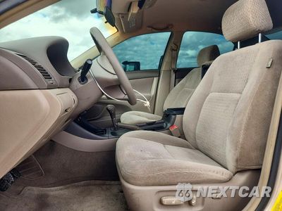 Zdjęcie 7 z 13 samochodu: 2004 TOYOTA CAMRY LE VIN:4T1BE30K44U910130 - miniatura