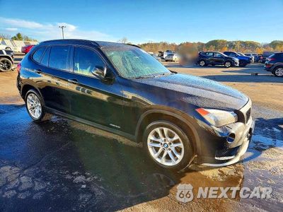 Czwarte zdjęcie samochodu z boku: 2015 BMW X1 XDRIVE28I VIN:WBAVL1C54FVY26126 - miniatura