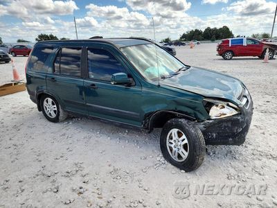 Czwarte zdjęcie samochodu z boku: 2004 HONDA CR-V EX VIN:JHLRD78814C000434 - miniatura