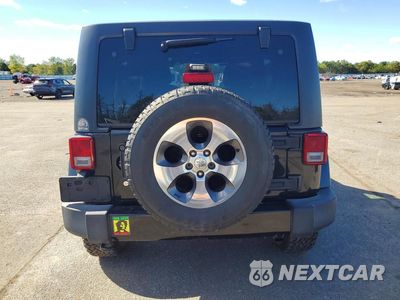 Zdjęcie 6 z 12 samochodu: 2016 JEEP WRANGLER UNLIMITED SAHARA VIN:1C4HJWEG8GL198649 - miniatura