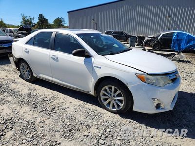 Czwarte zdjęcie samochodu z boku: 2012 TOYOTA CAMRY HYBRID XLE VIN:4T1BD1FK9CU031350 - miniatura