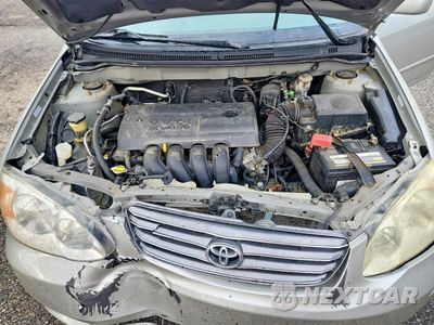 Zdjęcie 11 z 12 samochodu: 2004 TOYOTA COROLLA LE VIN:1NXBR32E64Z252953 - miniatura