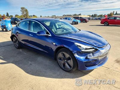 Czwarte zdjęcie samochodu z boku: 2018 TESLA MODEL 3 VIN:5YJ3E1EB2JF146496 - miniatura