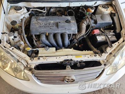 Zdjęcie 11 z 12 samochodu: 2003 TOYOTA COROLLA CE VIN:JTDBR32E630004020 - miniatura