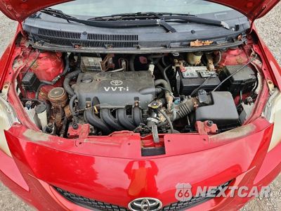 Zdjęcie 11 z 12 samochodu: 2010 TOYOTA YARIS BASE VIN:JTDBT4K35A1369107 - miniatura