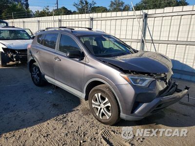 Czwarte zdjęcie samochodu z boku: 2017 TOYOTA RAV4 LE VIN:JTMZFREV5HJ128576 - miniatura
