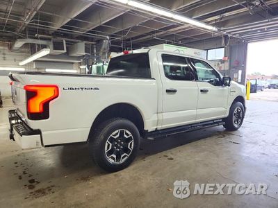 Trzecie zdjęcie samochodu z tyłu: 2022 FORD F150 LIGHTNING PRO VIN:1FTVW1EL9NWG12795 - miniatura