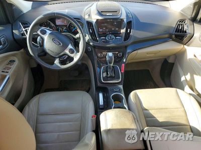 Zdjęcie 8 z 13 samochodu: 2014 FORD ESCAPE TITANIUM VIN:1FMCU0J94EUB61087 - miniatura