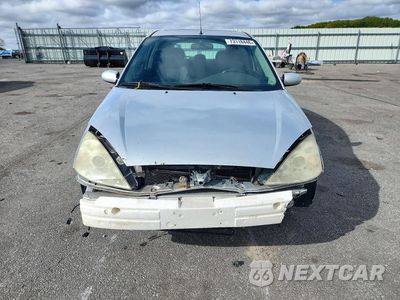 Piąte zdjęcie samochodu w środku: 2004 FORD FOCUS VIN:3FAHP39524R100286 - miniatura