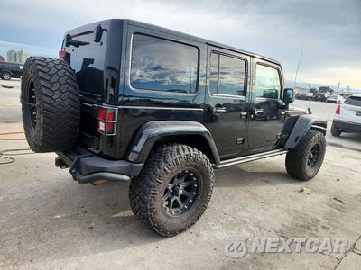 Trzecie zdjęcie samochodu z tyłu: 2013 JEEP WRANGLER UNLIMITED SAHARA VIN:1C4HJWEG5DL580603 - miniatura