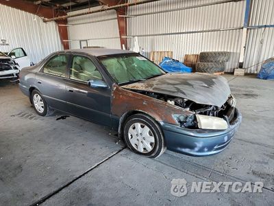 Czwarte zdjęcie samochodu z boku: 2001 TOYOTA CAMRY LE VIN:JT2BG22K910595472 - miniatura