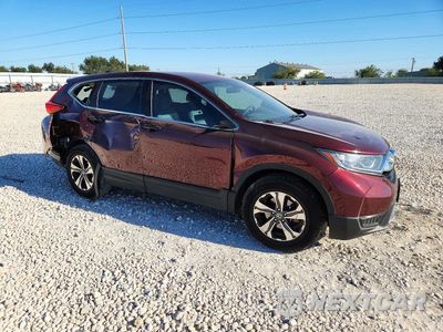 Czwarte zdjęcie samochodu z boku: 2017 HONDA CR-V LX VIN:7FARW5H31HE001645 - miniatura