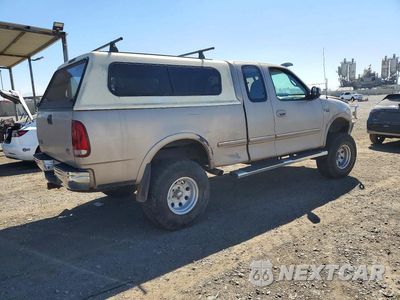 Trzecie zdjęcie samochodu z tyłu: 1997 FORD F150 VIN:1FTDX18W9VKD73335 - miniatura