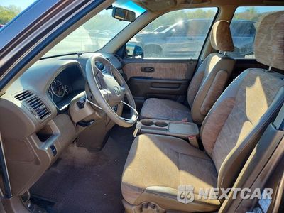 Zdjęcie 7 z 12 samochodu: 2003 HONDA CR-V LX VIN:JHLRD68463C013489 - miniatura