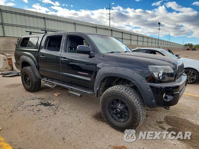 Czwarte zdjęcie samochodu z boku: 2011 TOYOTA TACOMA V6 VIN:3TMLU4EN4BM058836 - miniatura