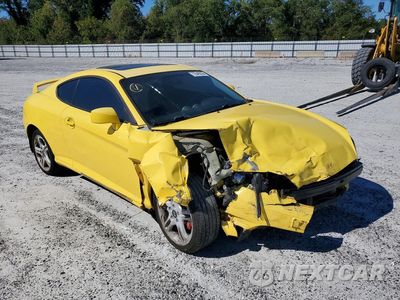 Czwarte zdjęcie samochodu z boku: 2006 HYUNDAI TIBURON GT VIN:KMHHN65F56U220106 - miniatura