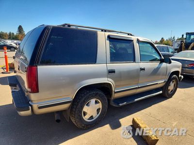 Trzecie zdjęcie samochodu z tyłu: 1999 CHEVROLET TAHOE K1500 VIN:1GNEK13R9XJ504722 - miniatura