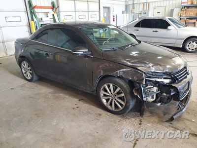 Czwarte zdjęcie samochodu z boku: 2013 VOLKSWAGEN EOS KOMFORT VIN:WVWBW8AH8DV008348 - miniatura