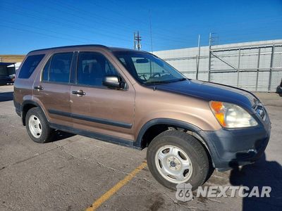 Czwarte zdjęcie samochodu z boku: 2003 HONDA CR-V LX VIN:JHLRD68463C013489 - miniatura