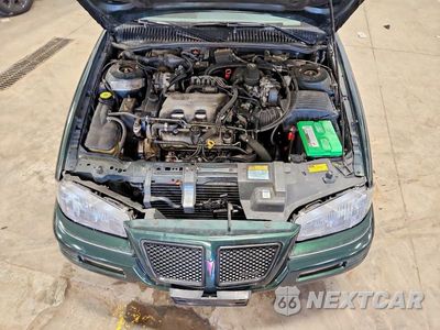 Zdjęcie 11 z 12 samochodu: 1995 PONTIAC GRAND AM SE VIN:1G2NE15M5SM555096 - miniatura