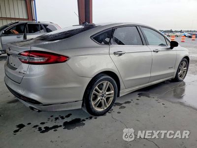 Trzecie zdjęcie samochodu z tyłu: 2018 FORD FUSION SE HYBRID VIN:3FA6P0LU5JR280011 - miniatura