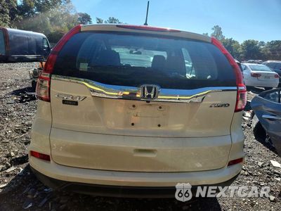 Zdjęcie 6 z 14 samochodu: 2016 HONDA CR-V LX VIN:5J6RM4H38GL131911 - miniatura