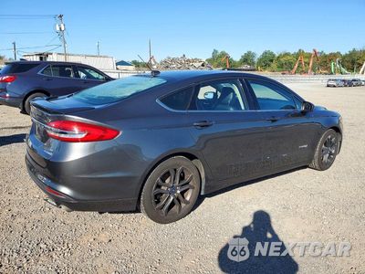 Trzecie zdjęcie samochodu z tyłu: 2018 FORD FUSION SE HYBRID VIN:3FA6P0LU4JR239143 - miniatura