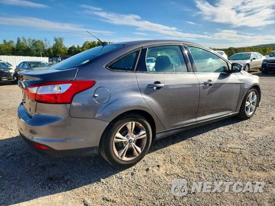 Trzecie zdjęcie samochodu z tyłu: 2014 FORD FOCUS SE VIN:1FADP3F20EL246677 - miniatura