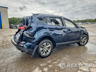 Trzecie zdjęcie samochodu z tyłu: 2018 TOYOTA RAV4 HYBRID LE VIN:JTMRJREV8JD225810 - miniatura