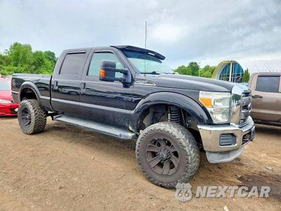 Czwarte zdjęcie samochodu z boku: 2014 FORD F250 SUPER DUTY VIN:1FT7W2B6XEEA24617 - miniatura