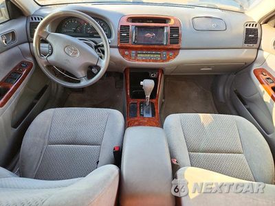 Zdjęcie 8 z 12 samochodu: 2003 TOYOTA CAMRY XLE VIN:4T1BE30KX3U685078 - miniatura