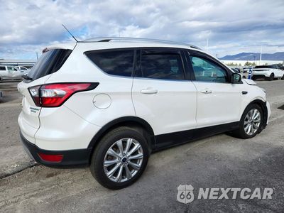 Trzecie zdjęcie samochodu z tyłu: 2017 FORD ESCAPE TITANIUM VIN:1FMCU0J93HUD54299 - miniatura