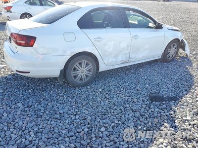 Trzecie zdjęcie samochodu z tyłu: 2017 VOLKSWAGEN JETTA S VIN:3VW2B7AJ2HM214559 - miniatura