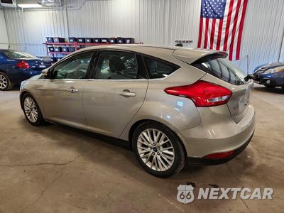 Drugie zdjęcie samochodu z przodu: 2016 FORD FOCUS TITANIUM VIN:1FADP3N20GL234226 - miniatura