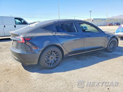 Trzecie zdjęcie samochodu z tyłu: 2025 TESLA MODEL 3 VIN:5YJ3E1EA2SF986898 - miniatura