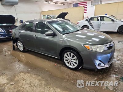 Czwarte zdjęcie samochodu z boku: 2012 TOYOTA CAMRY HYBRID XLE VIN:4T1BD1FK2CU056641 - miniatura