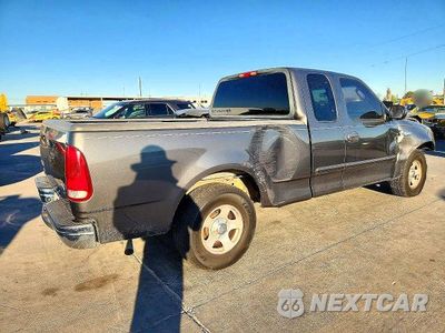 Trzecie zdjęcie samochodu z tyłu: 2002 FORD F150 VIN:1FTRX17252NC08199 - miniatura