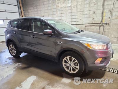 Czwarte zdjęcie samochodu z boku: 2017 FORD ESCAPE SE VIN:1FMCU9GD3HUB50375 - miniatura